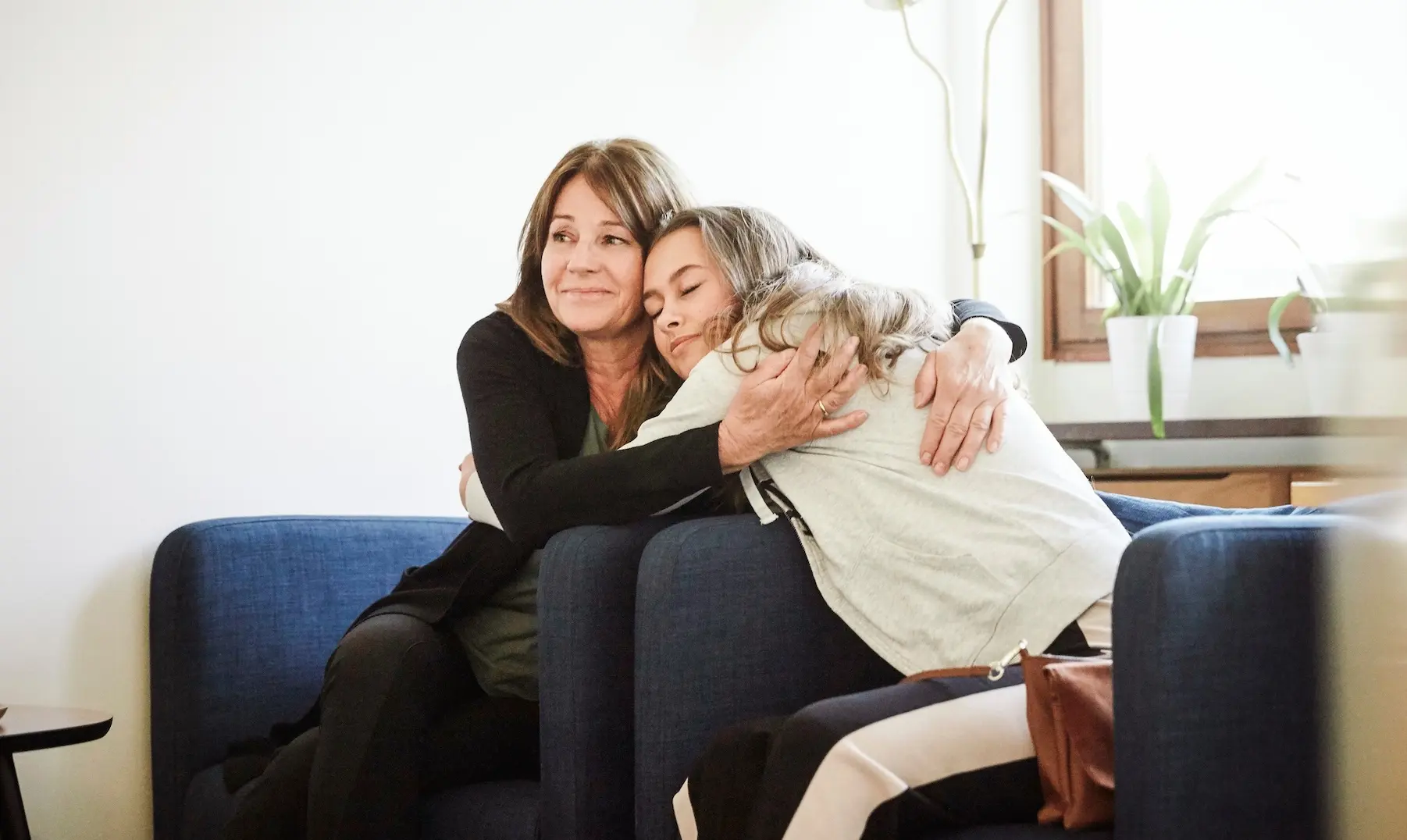 mother and daughter hugging